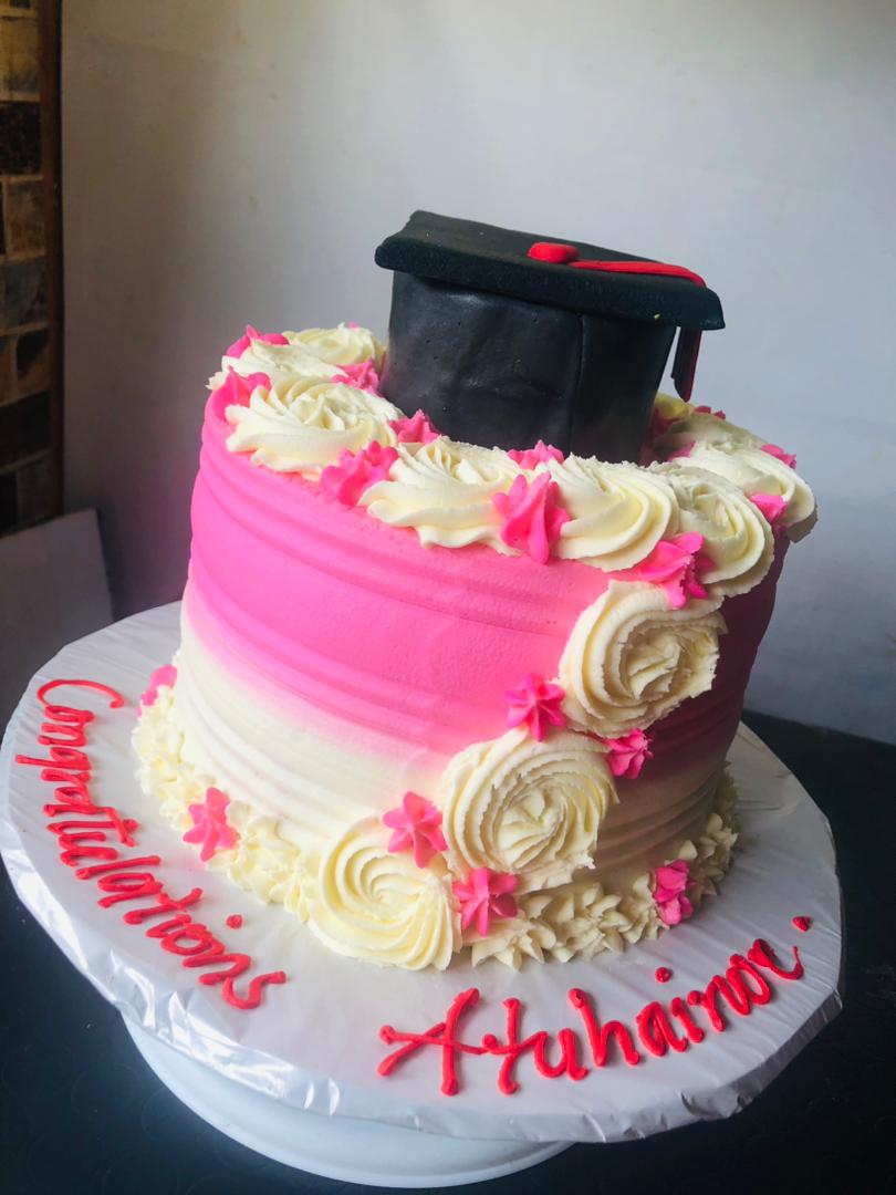 CREAM FLORAL GRADUATION CAKE 