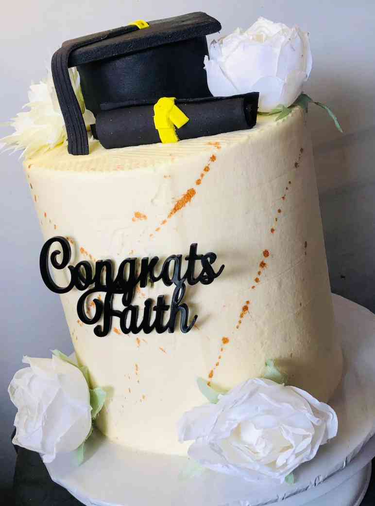 GRADUATION CAKE WITH A CUSTOMISED NAME .MK