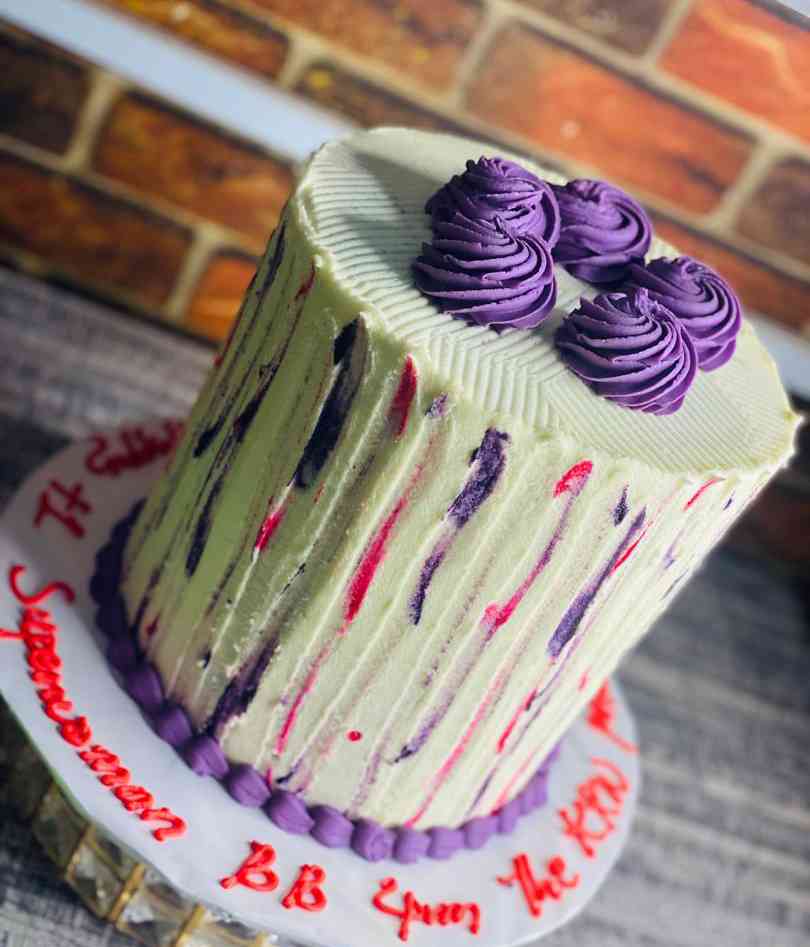 PURPLE AND CREAM BIRTHDAY CAKE .DF