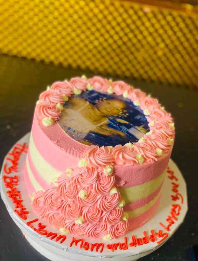 PINK AND CREAM EDIBLE CAKE