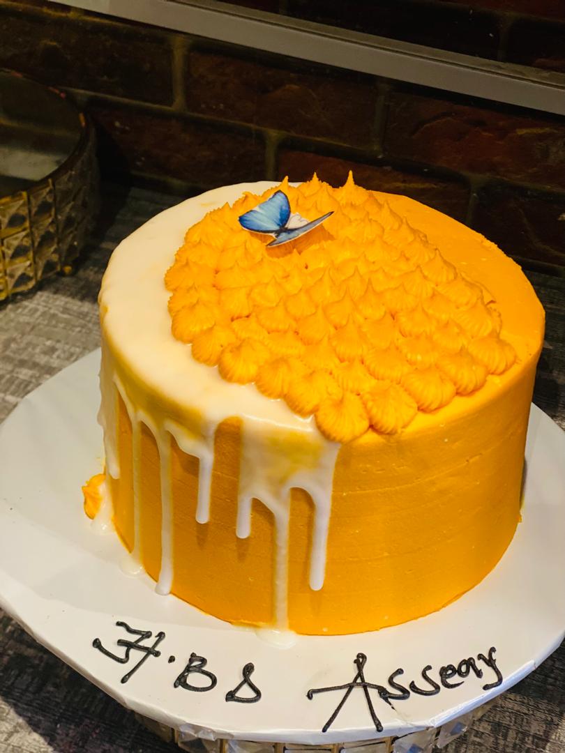 ORANGE WHITE DRIPPING BIRTHDAY CAKE