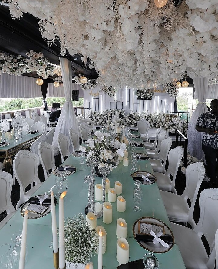 All white wedding table set up 