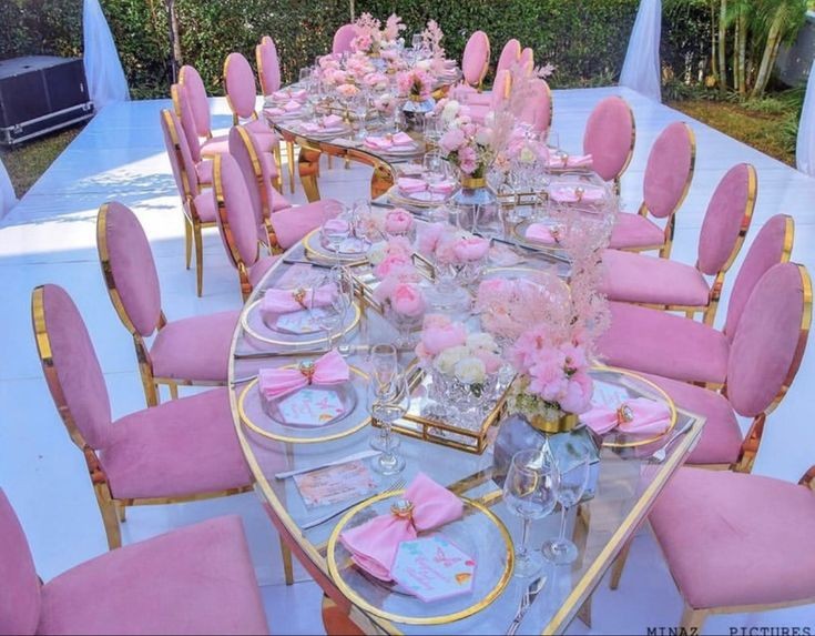 pink and gold chair and table setting 