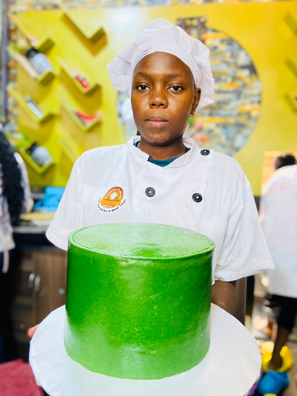 Our student Lairah showing her well designed fondant cake 