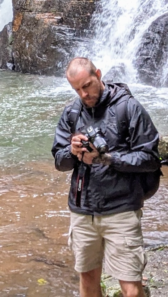 Me with a camera in the forest