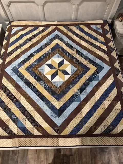 Brown Quilt With Star 