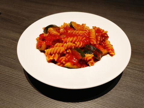 Pasta with tomato garlic sauce and fresh vegetables