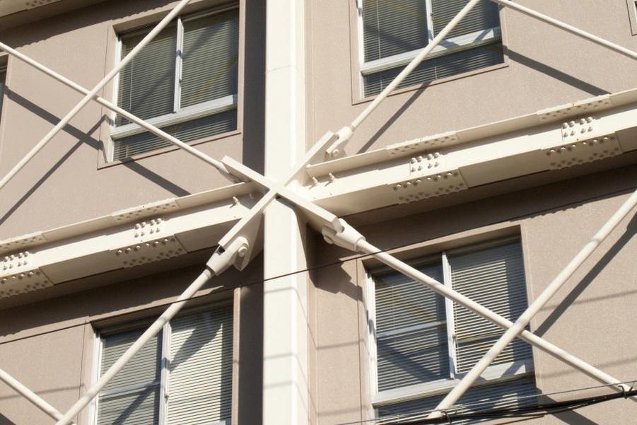 Seismic retrofitting adds structural reinforcement to older buildings, preventing catastrophic collapse.