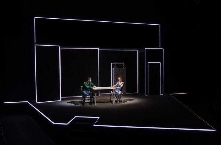 Fluid staging and minimalist set design are essential in representing the overlapping spaces of the narrative.