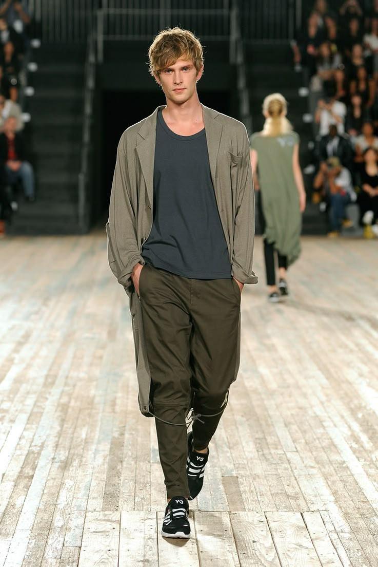 Kim Young-kwang's career began on the runway, where his physical presence immediately commanded attention.