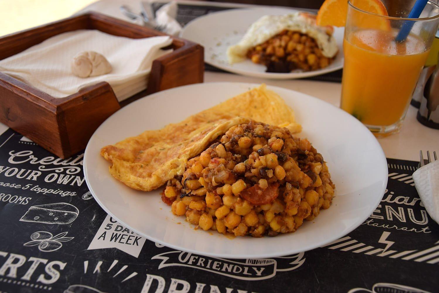 Cachupa, the hearty corn and bean stew that serves as the culinary symbol of Cabo Verdean identity.