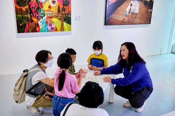 Iimura's participation in community arts initiatives demonstrates his commitment to empowering younger generations.