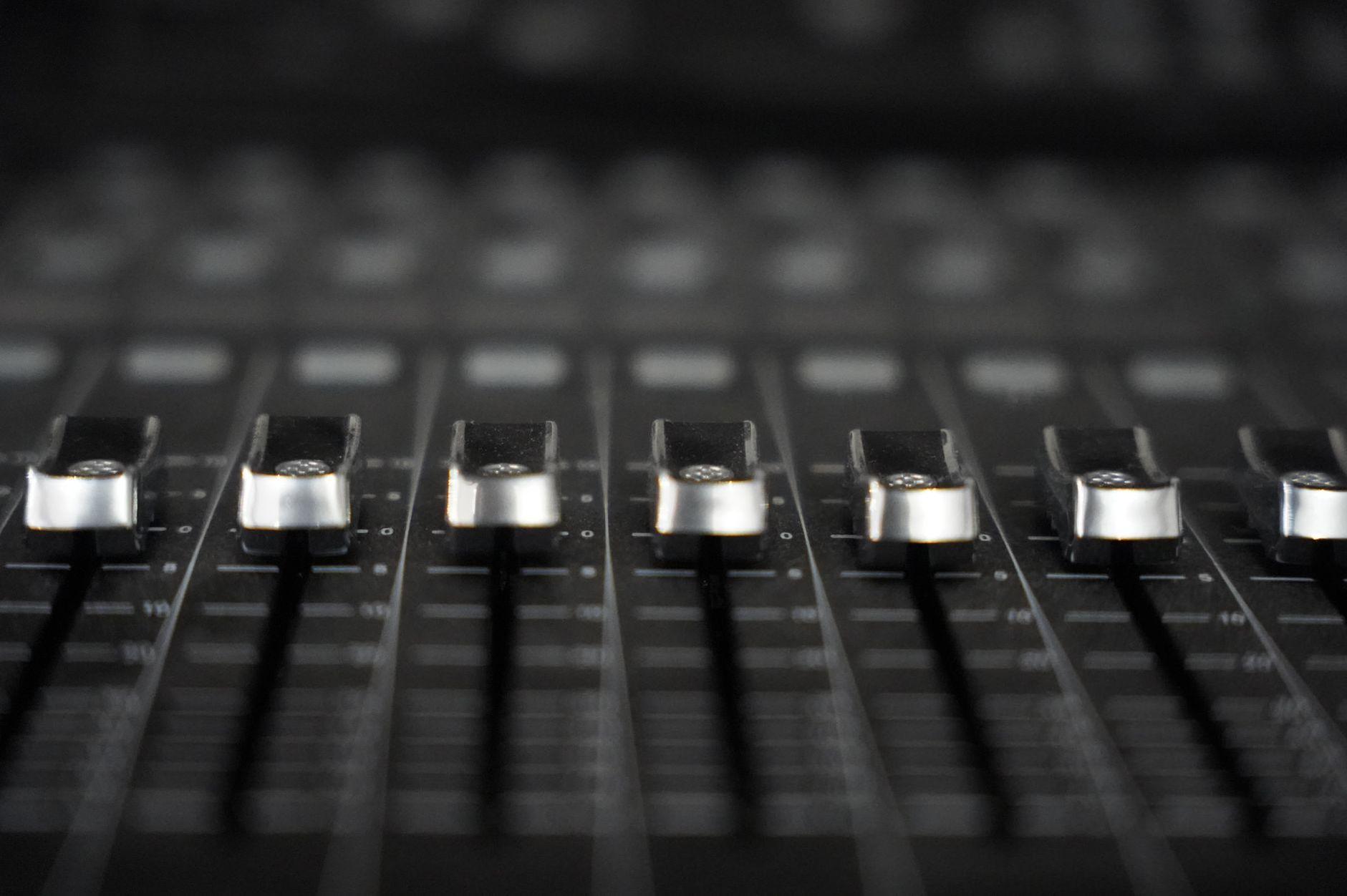 General visual reference for Current Status and Continuing Work. Source: Pexels / Photo by David Maat / Pexels License / https://www.pexels.com/photo/close-up-of-audio-mixer-faders-in-studio-setting-28930613/