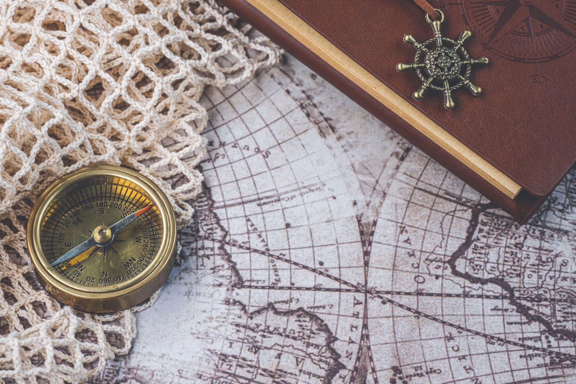 General visual reference for A Triumphant Return and a Change of Pace (2010). Source: Pexels / Photo by Ylanite Koppens / Pexels License / https://www.pexels.com/photo/compass-on-map-14436288/