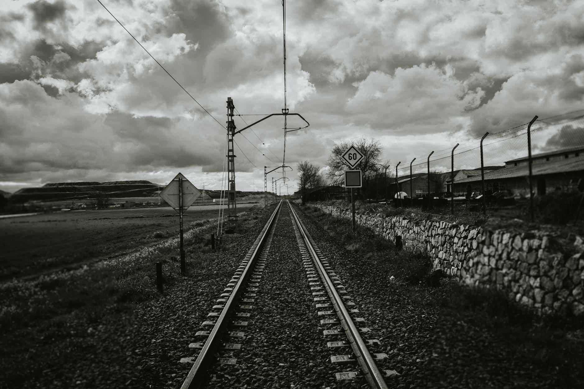 General visual reference for A Global Phenomenon: 'Train to Busan' (2016). Source: Pexels / Photo by Juan Pablo Serrano / Pexels License / https://www.pexels.com/photo/grayscale-photograph-of-train-rail-1002691/