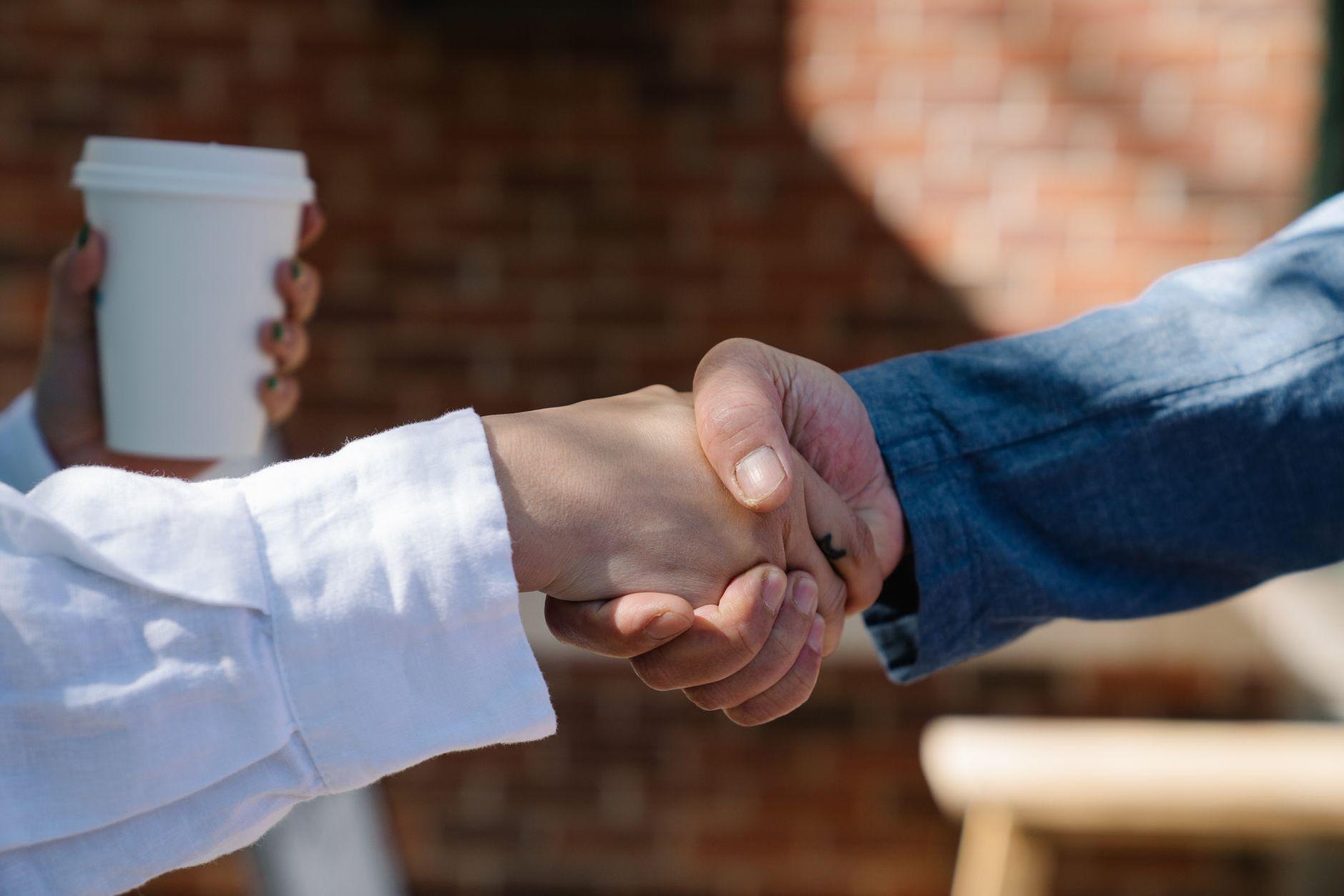 General visual reference for Reputation for Pragmatism and Reliability. Source: Pexels / Photo by Felicity Tai / Pexels License / https://www.pexels.com/photo/close-up-photo-of-people-shaking-hands-7964468/