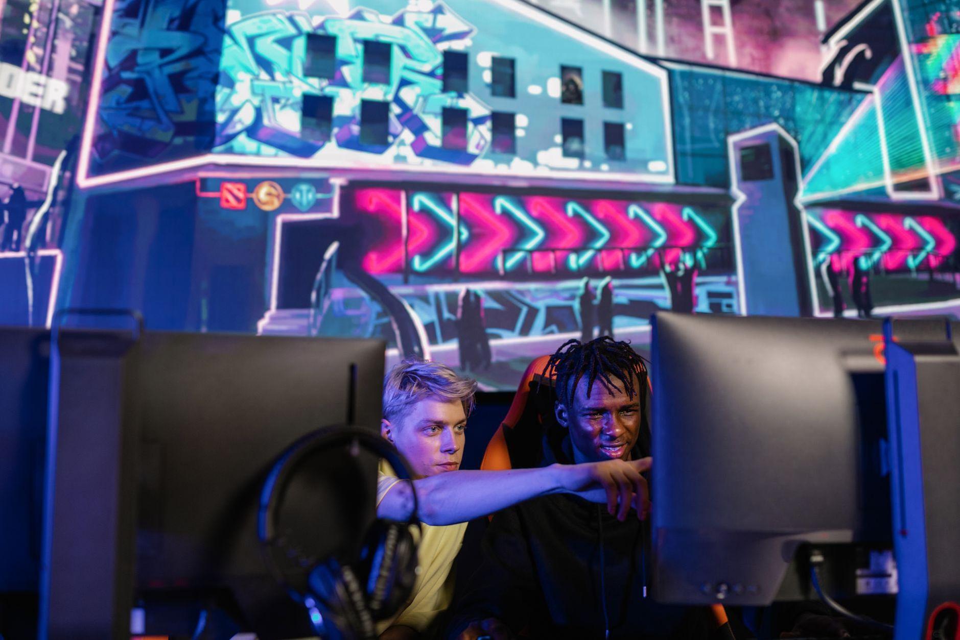 General visual reference for Core Gameplay Focus: League of Legends. Source: Pexels / Photo by Alena Darmel / Pexels License / https://www.pexels.com/photo/two-men-playing-computer-game-7862653/