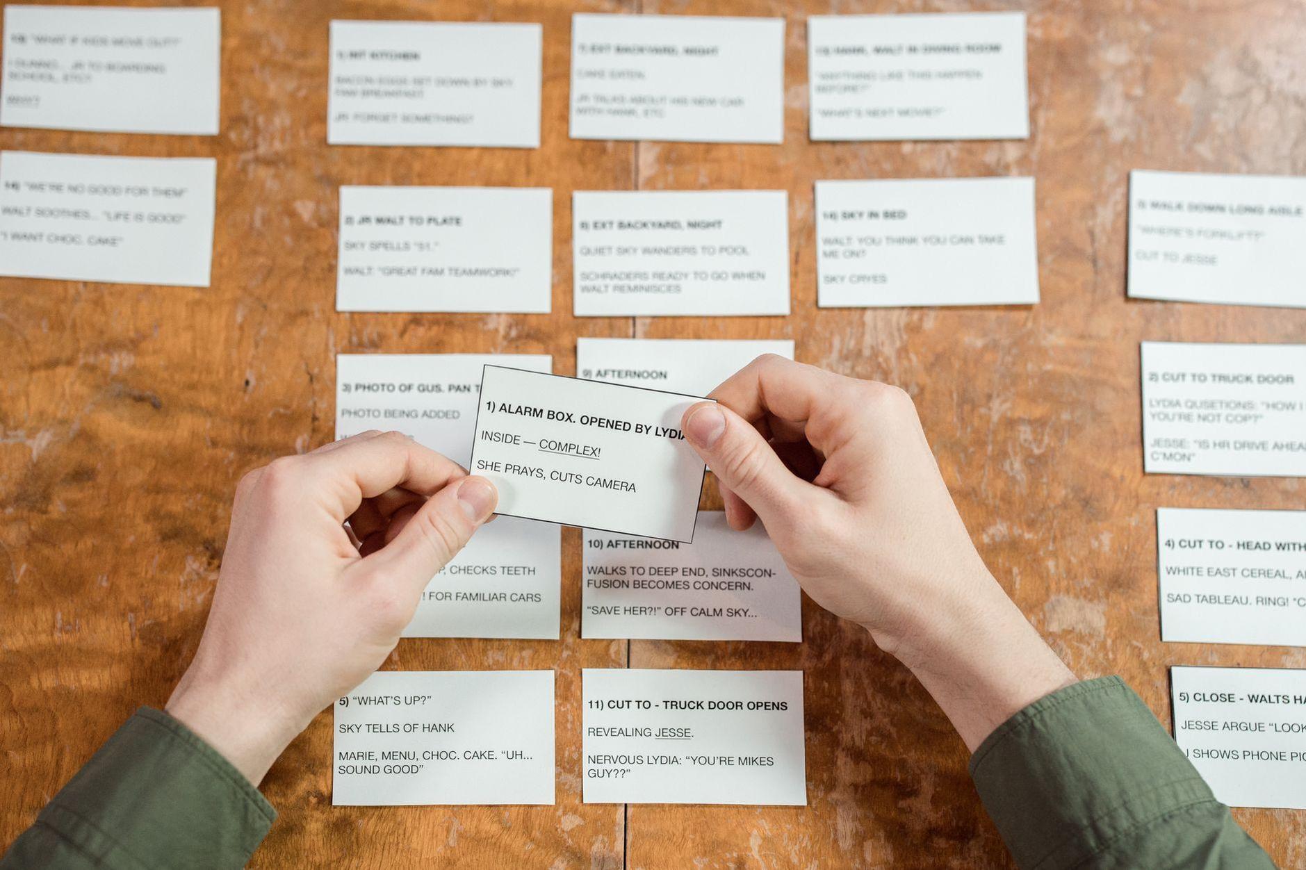General visual reference for His Approach to the Writers' Room and Pacing. Source: Pexels / Photo by Ron Lach / Pexels License / https://www.pexels.com/photo/close-up-of-person-sitting-at-desk-studying-with-cards-8035282/