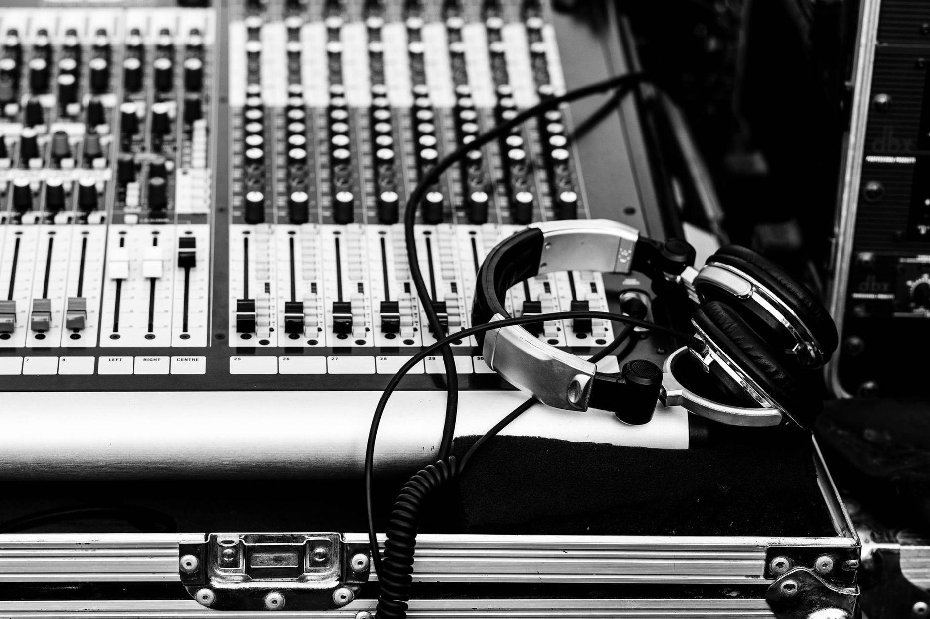 General visual reference for The Crucial Role of Music in His Work. Source: Pexels / Photo by Roktim | রক্তিম 🇧🇩 / Pexels License / https://www.pexels.com/photo/black-and-white-audio-mixer-with-headphones-30642555/