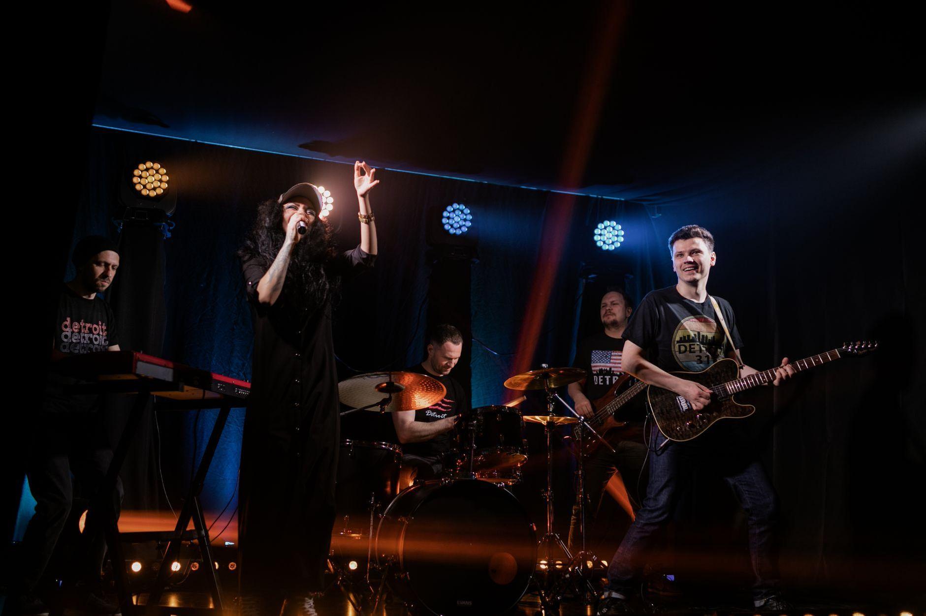General visual reference for Rock Revitalization: Novasonic and Emerald Castle. Source: Pexels / Photo by Alena Darmel / Pexels License / https://www.pexels.com/photo/rock-band-performing-on-stage-7715754/