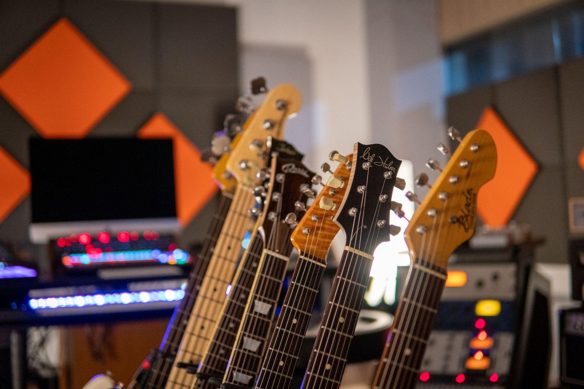 General visual reference for Contribution to Korean Ballad and Rock Preservation. Source: Pexels / Photo by Andreu Marquès / Pexels License / https://www.pexels.com/photo/brown-and-black-electric-guitars-7450050/