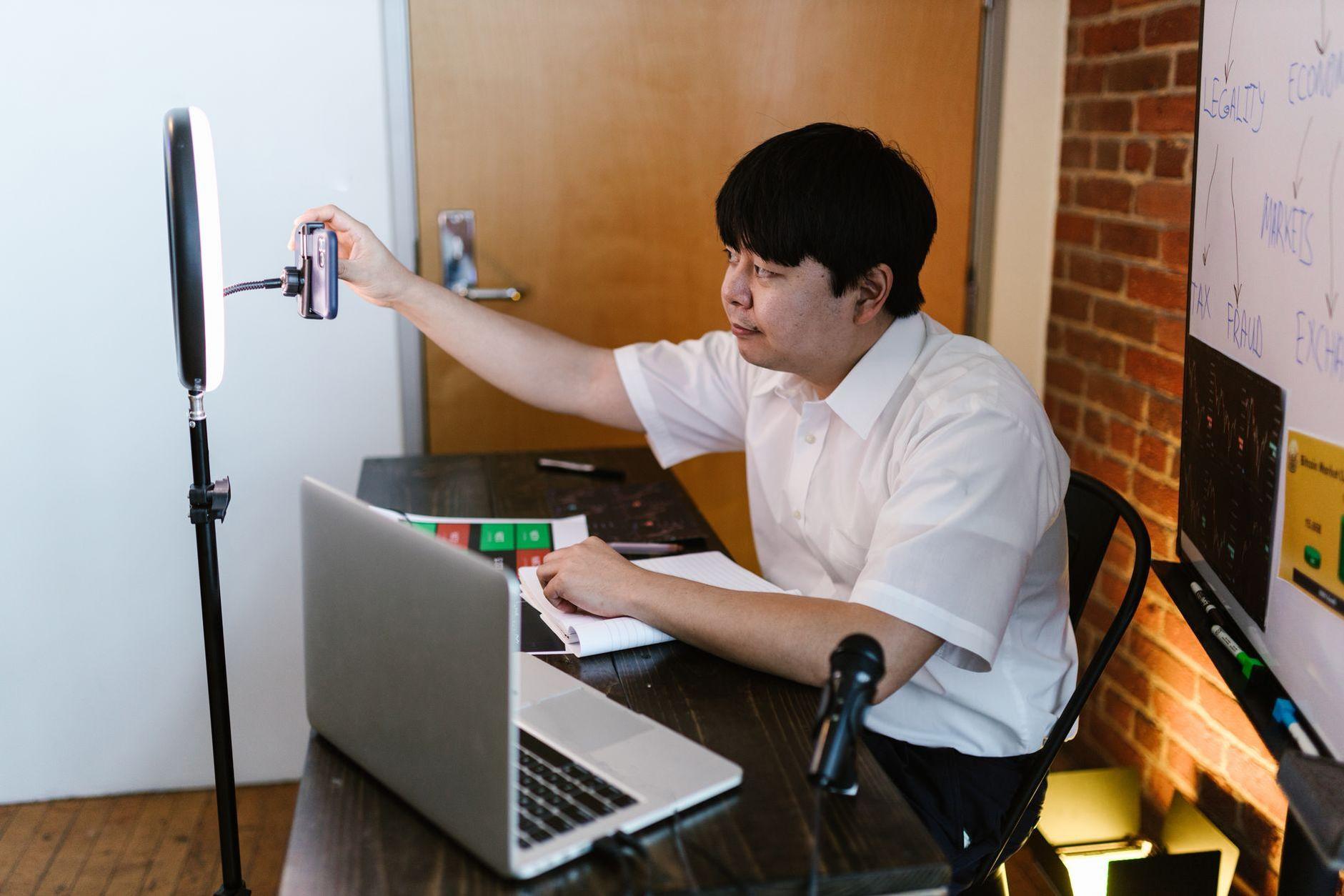 General visual reference for Overcoming Industry Challenges. Source: Pexels / Photo by RDNE Stock project / Pexels License / https://www.pexels.com/photo/male-blogger-fixing-the-position-of-a-smartphone-8369771/