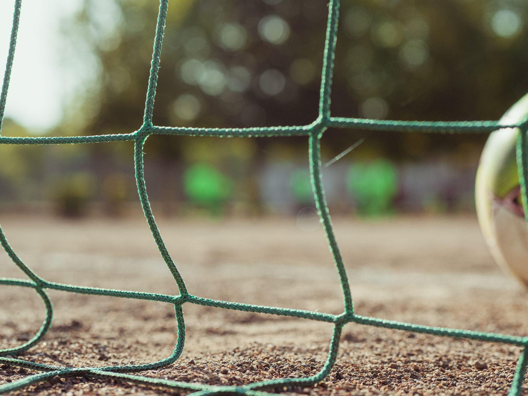 General visual reference for The Art of One-Touch Finishing. Source: Pexels / Photo by Tembela Bohle / Pexels License / https://www.pexels.com/photo/football-goal-on-shabby-stadium-in-summer-5382523/