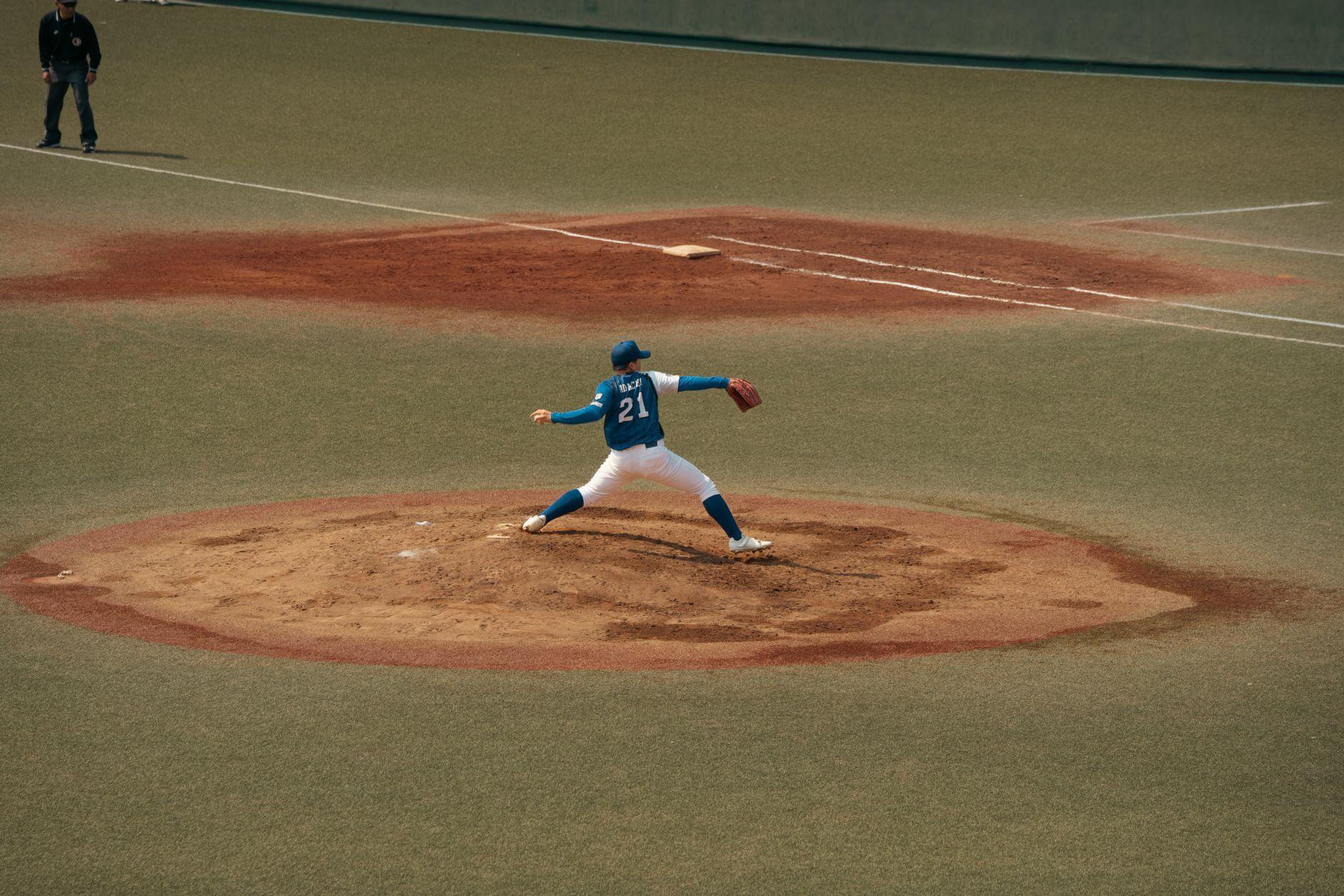 General visual reference for Early Professional Adjustments. Source: Pexels / Photo by Iban Lopez Luna / Pexels License / https://www.pexels.com/photo/dynamic-baseball-pitcher-in-action-on-tokyo-field-36780551/