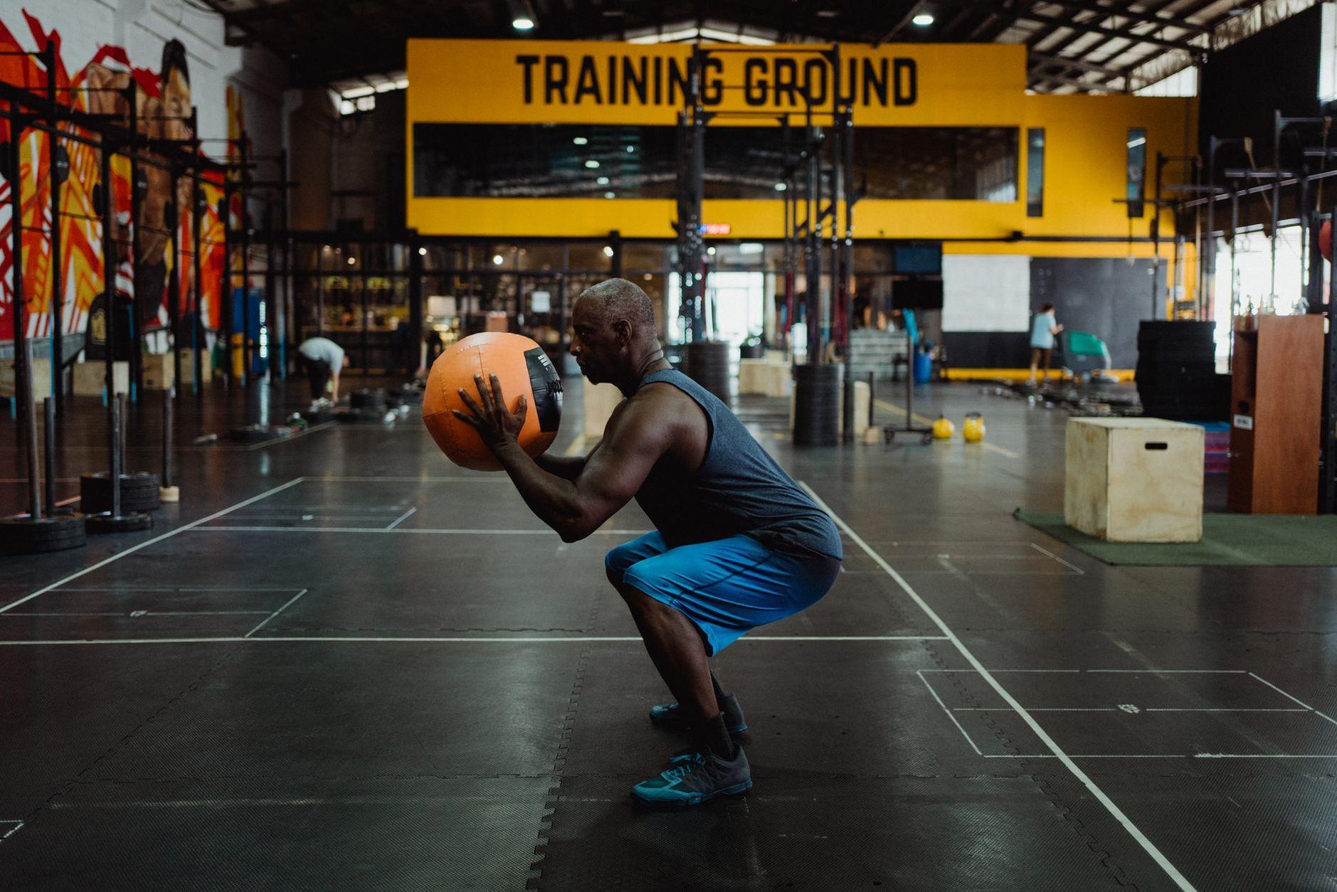 General visual reference for Physical Characteristics and Training Regimen. Source: Pexels / Photo by Ketut Subiyanto / Pexels License / https://www.pexels.com/photo/man-doing-squat-while-holding-a-gym-ball-4720555/