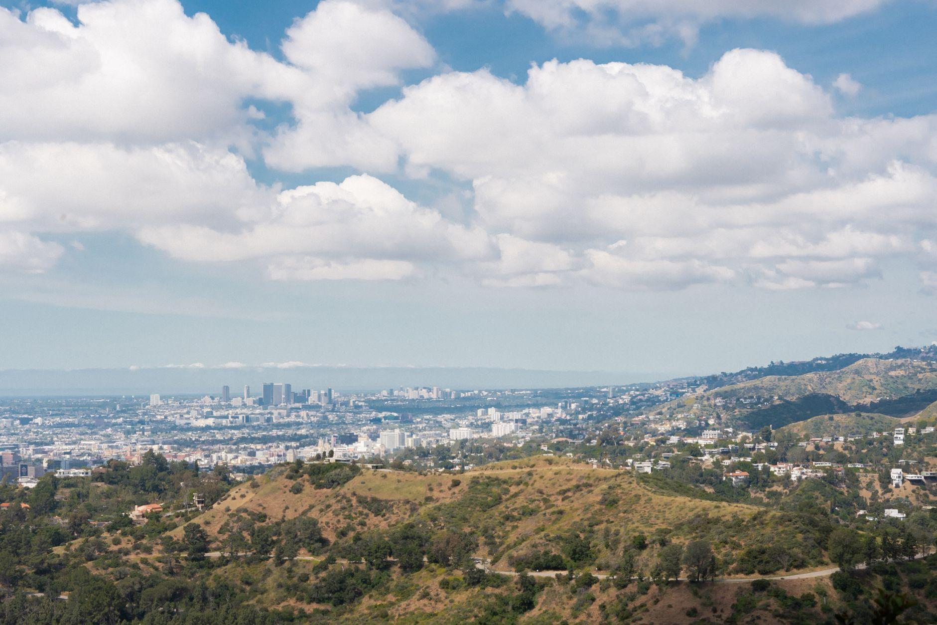 General visual reference for Early Life and Cross-Cultural Background. Source: Pexels / Photo by Anastasiya Badun / Pexels License / https://www.pexels.com/photo/clouds-building-los-angeles-smog-17445603/
