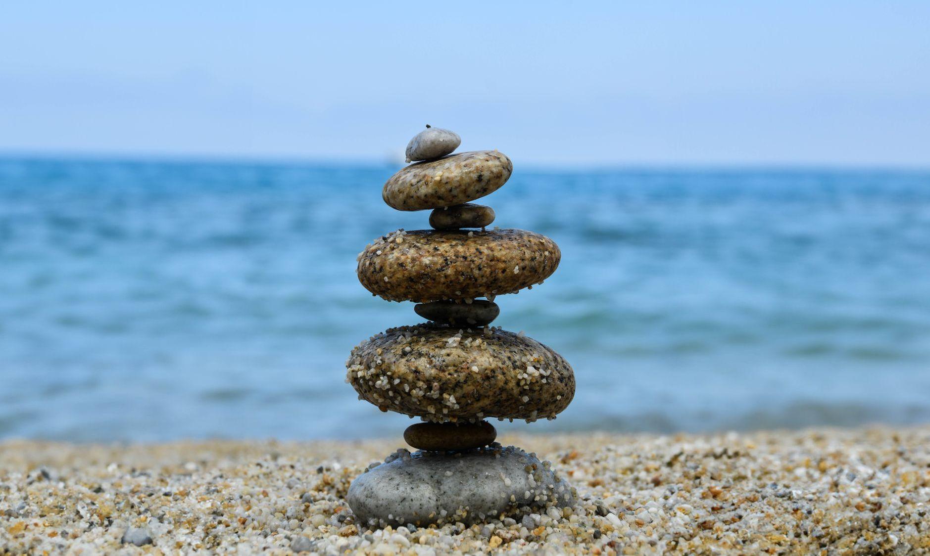 General visual reference for Vestibular Rehabilitation Therapy (VRT). Source: Pexels / Photo by Elona Agug / Pexels License / https://www.pexels.com/photo/a-stack-of-rocks-on-the-beach-with-the-ocean-in-the-background-17721476/