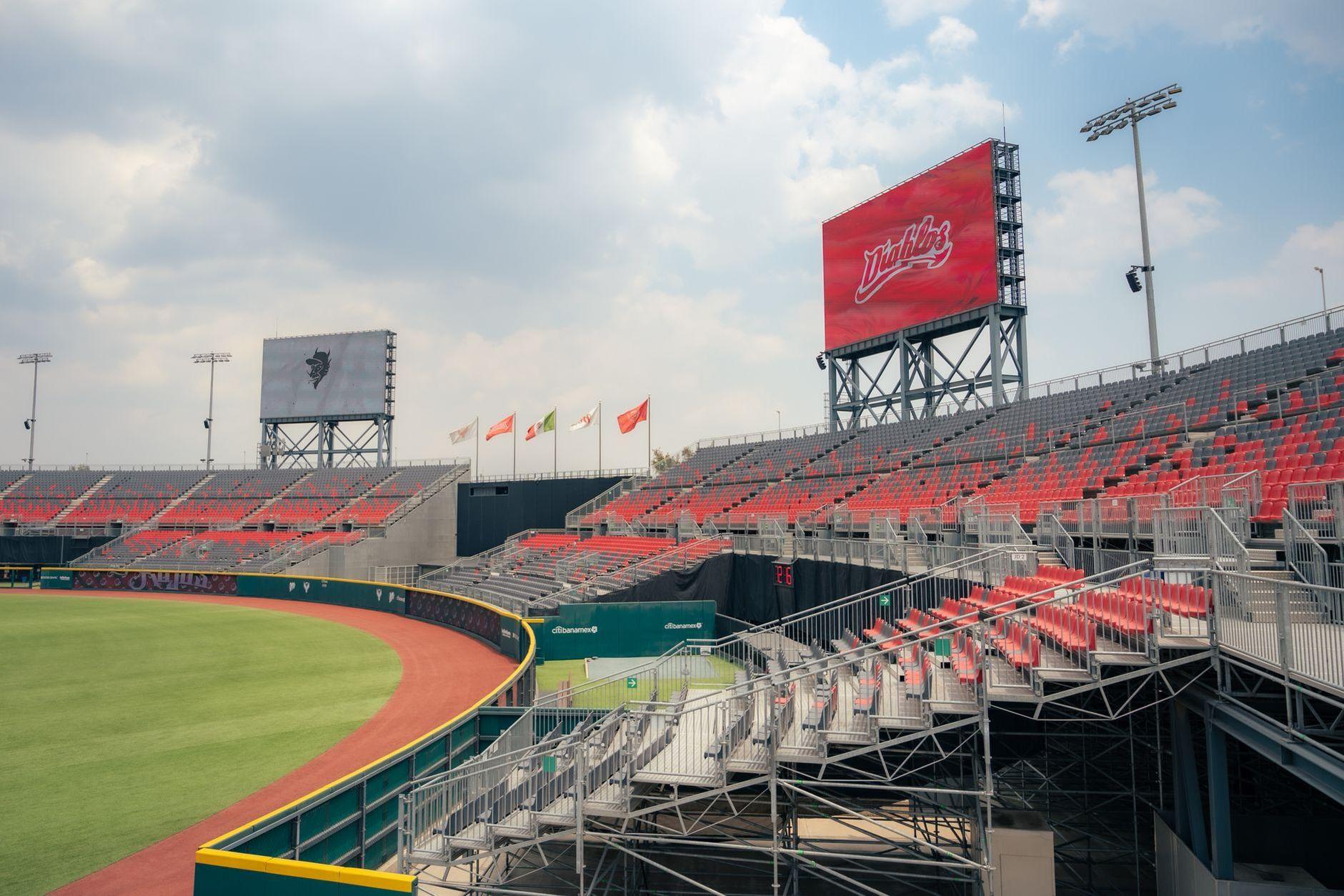 General visual reference for Promotion to Single-A Palm Beach. Source: Pexels / Photo by Israel Torres / Pexels License / https://www.pexels.com/photo/a-baseball-stadium-with-red-seats-and-a-scoreboard-17723978/