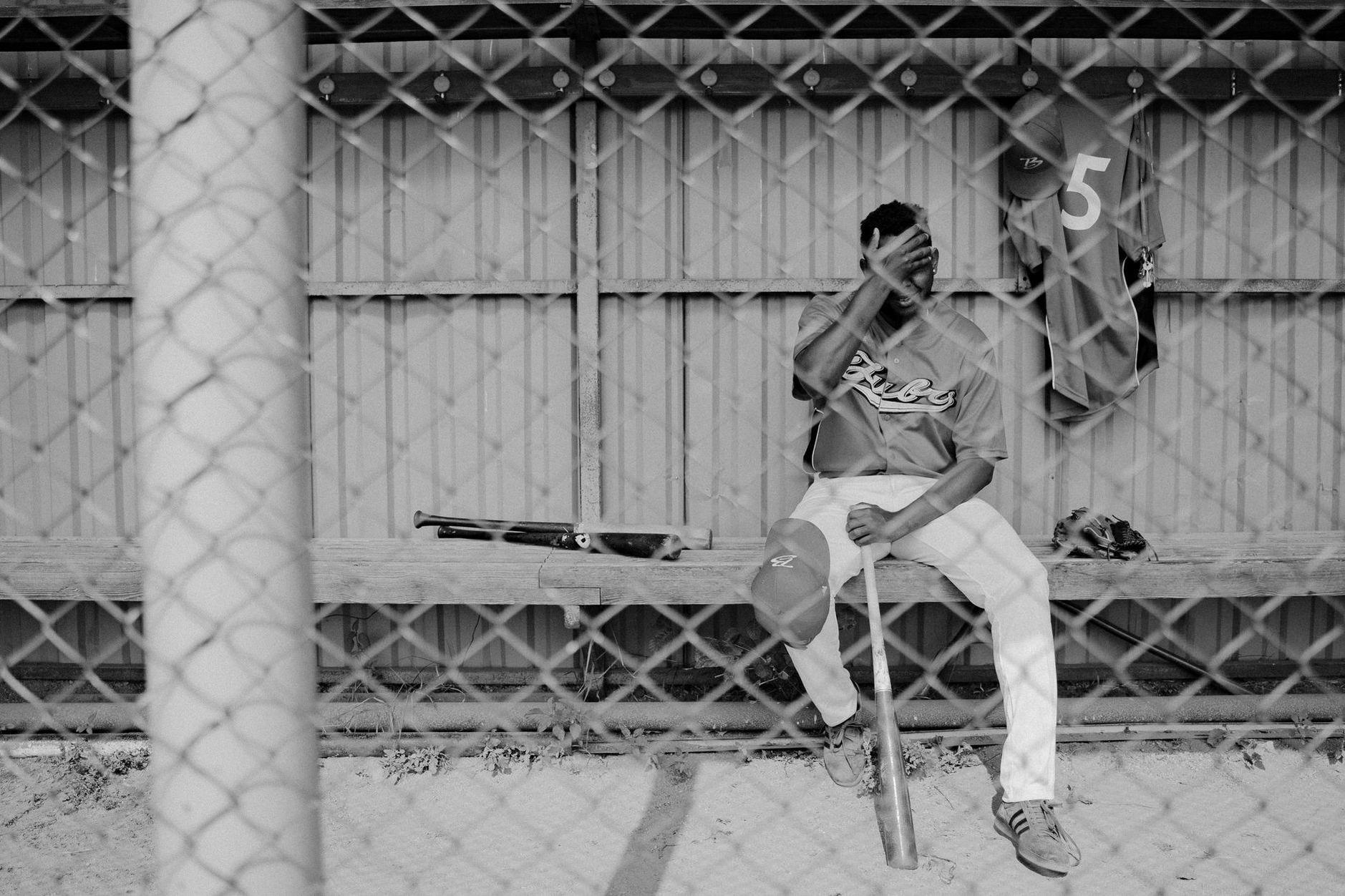 General visual reference for Navigating Minor League Hurdles. Source: Pexels / Photo by Tima Miroshnichenko / Pexels License / https://www.pexels.com/photo/baseball-player-sitting-on-a-bench-5184689/