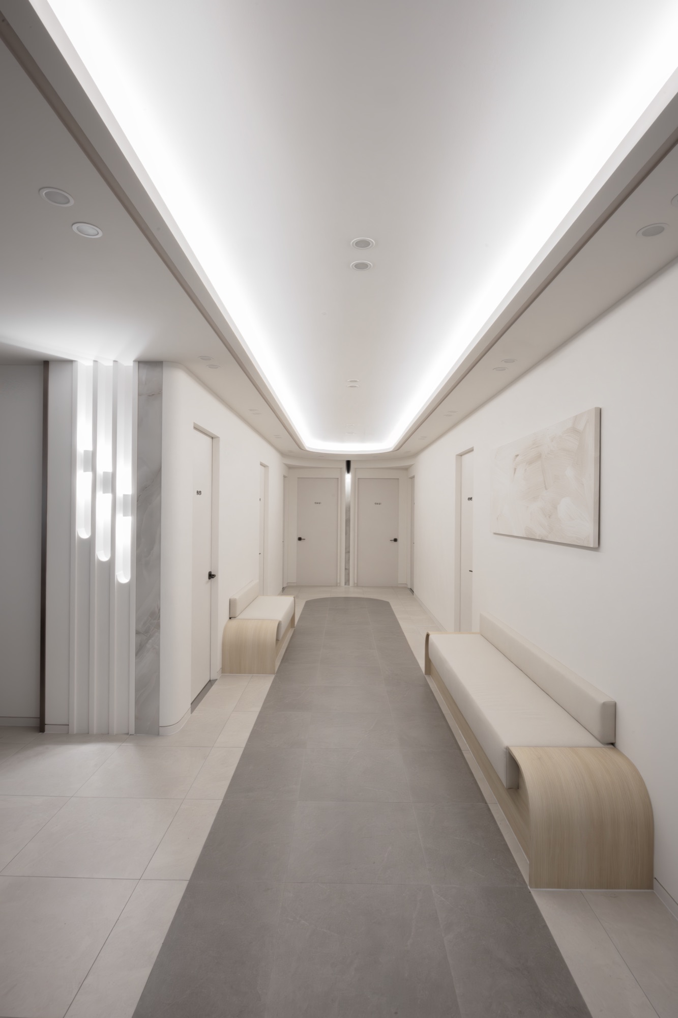 Bright corridor leading to the treatment rooms