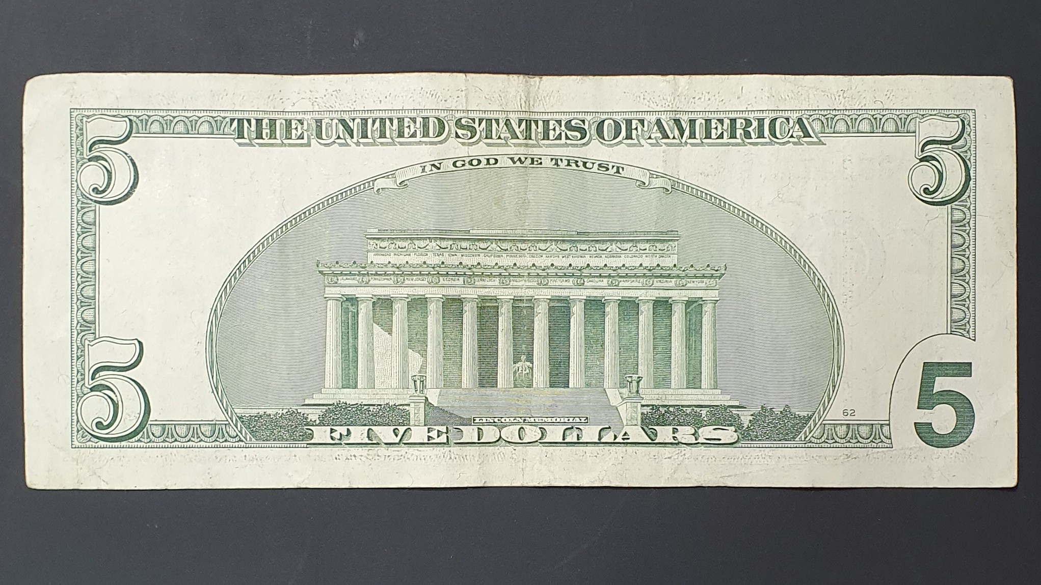 5 Dollar back