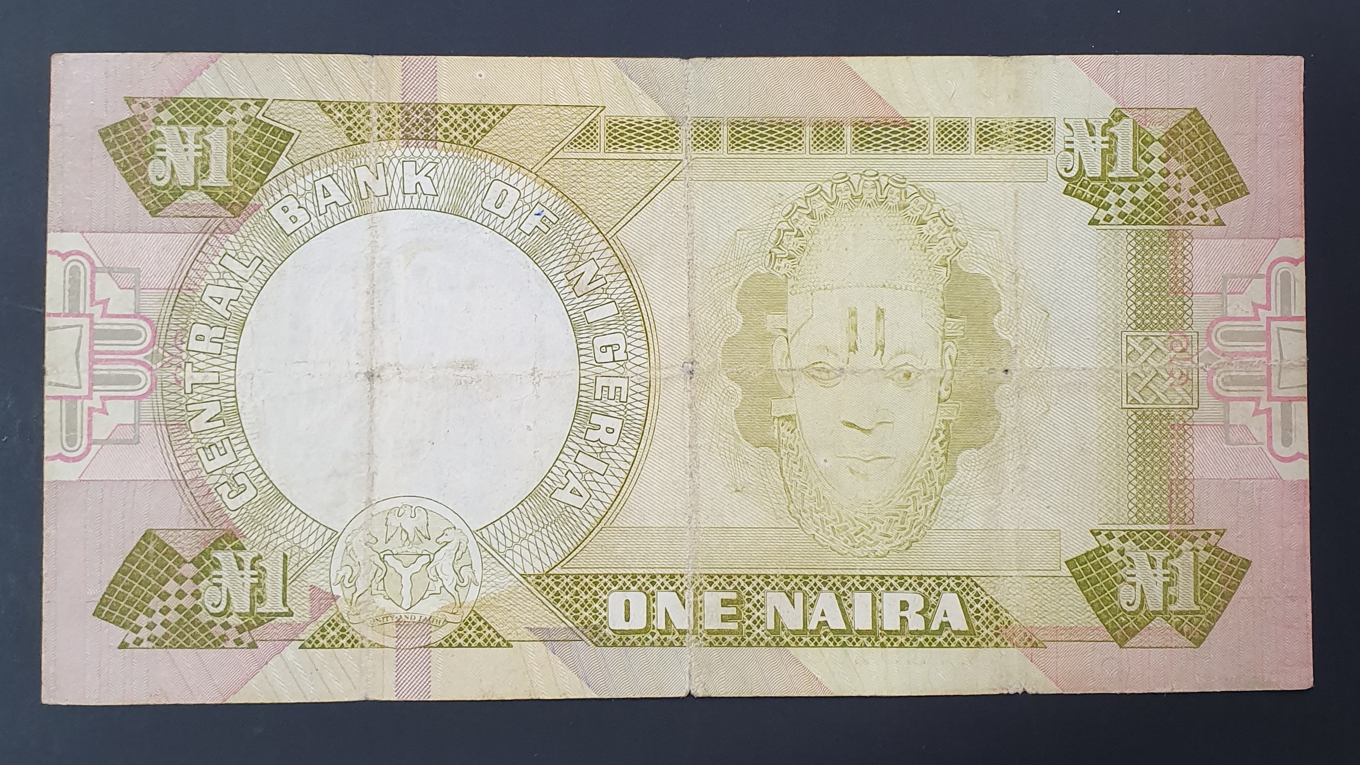 1 Naira back