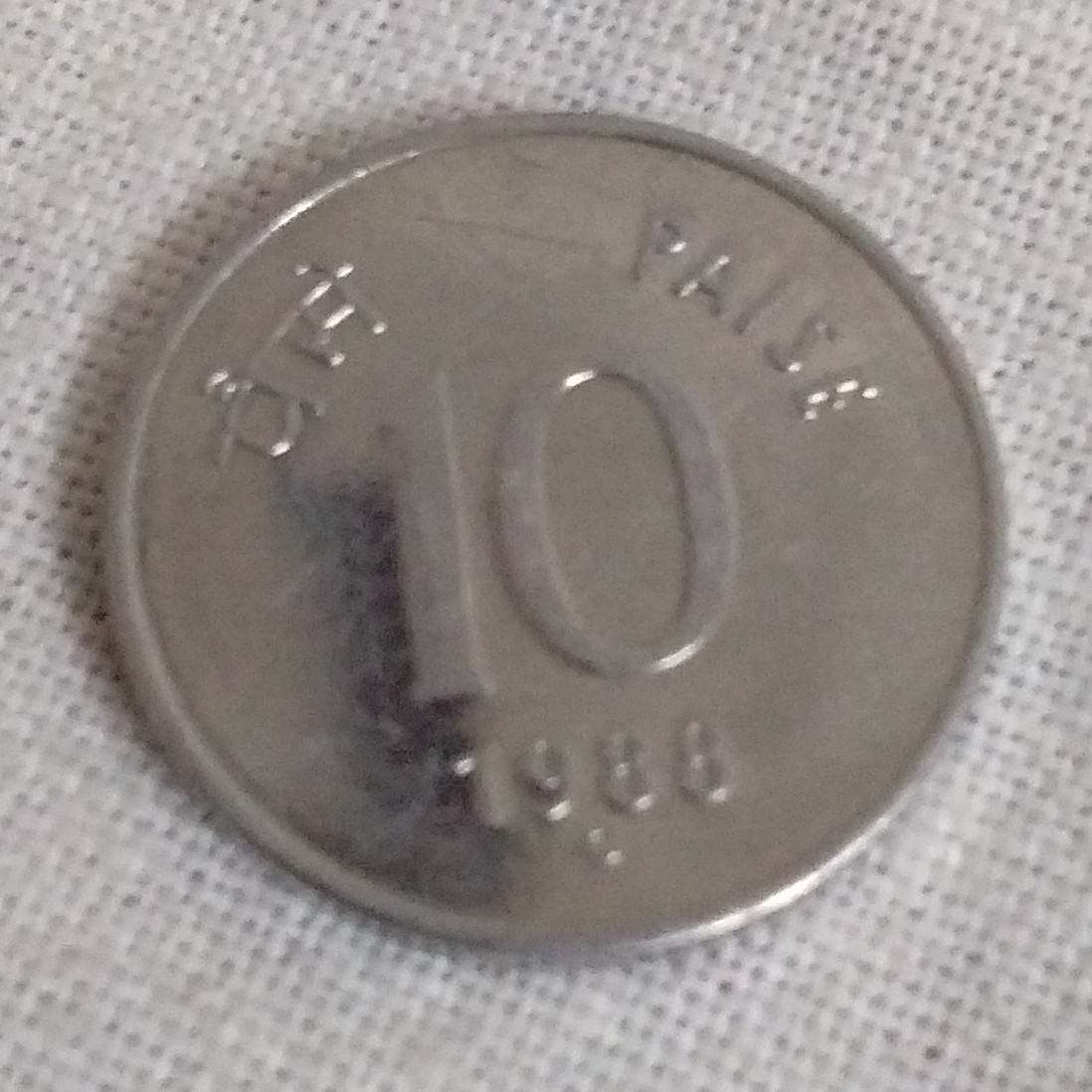 10 Paisa back