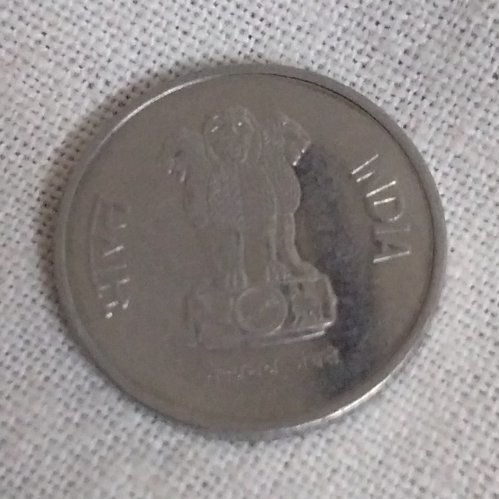 10 Paisa front