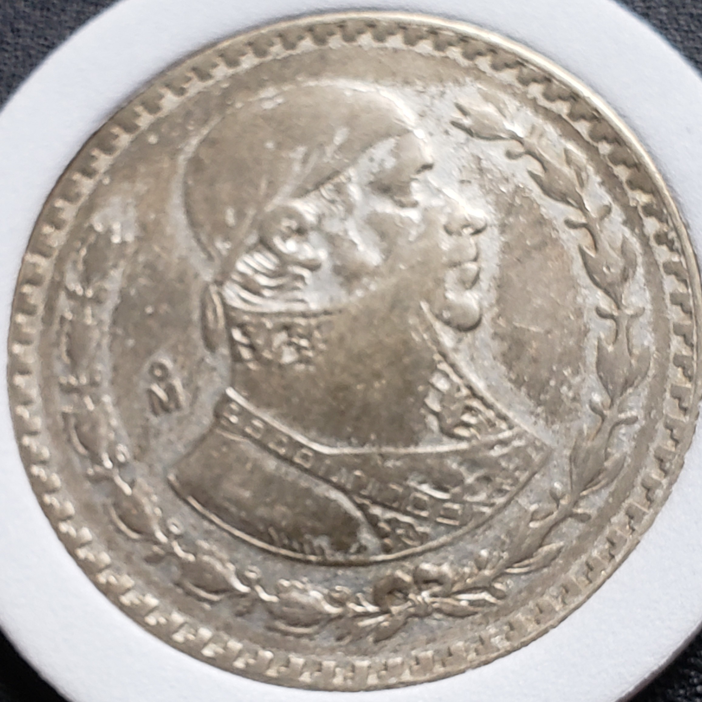 1 Peso back