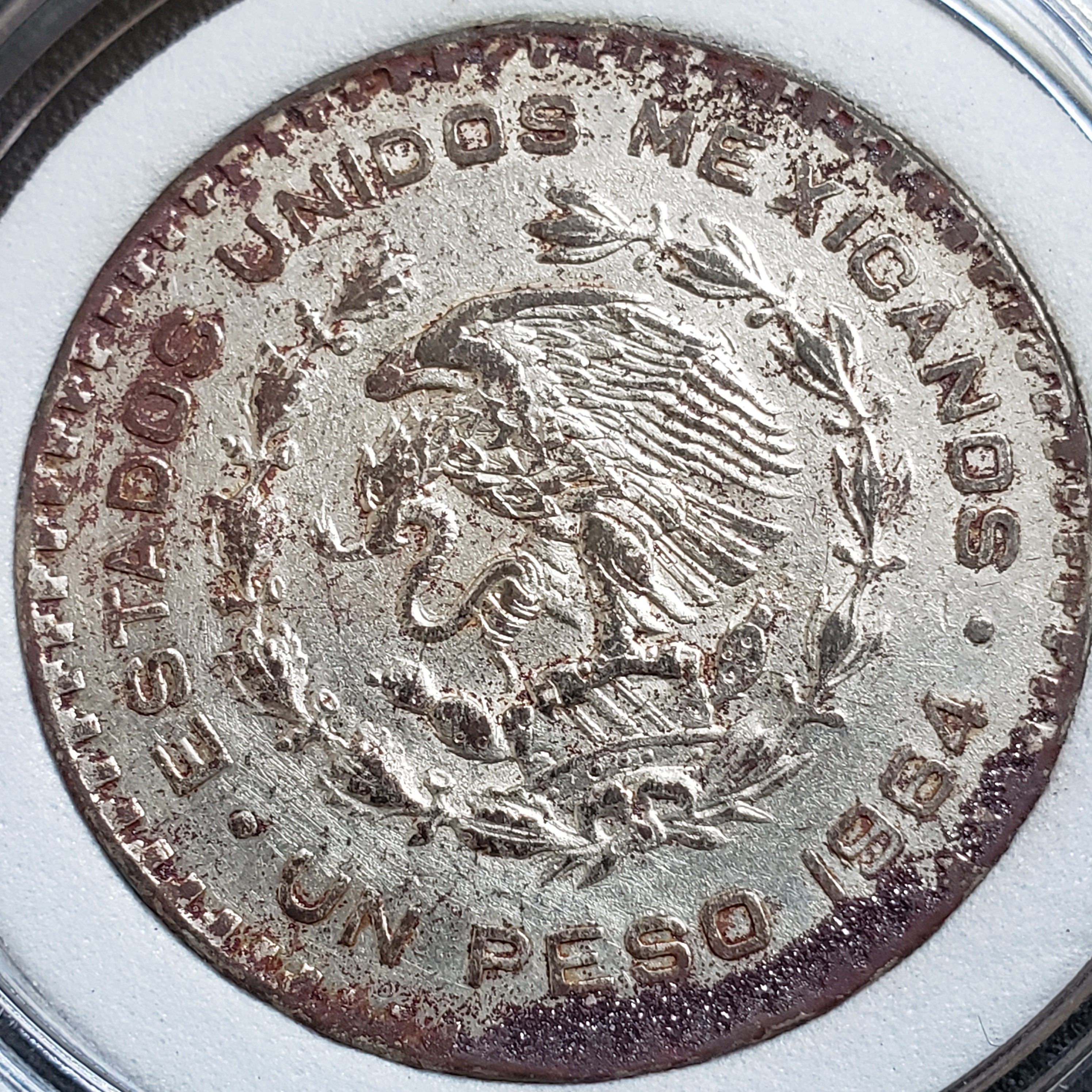 1 Peso back