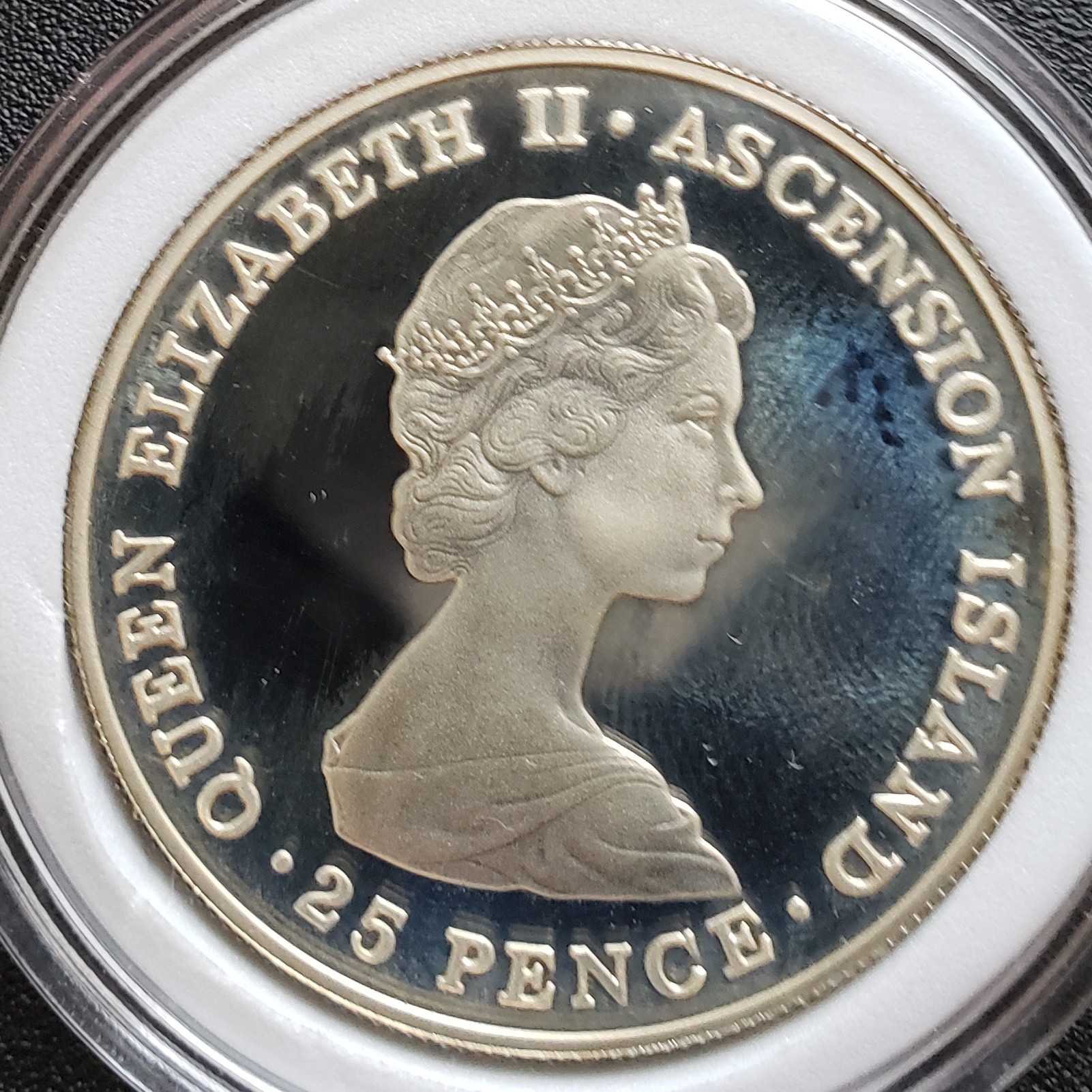 25 Pence back