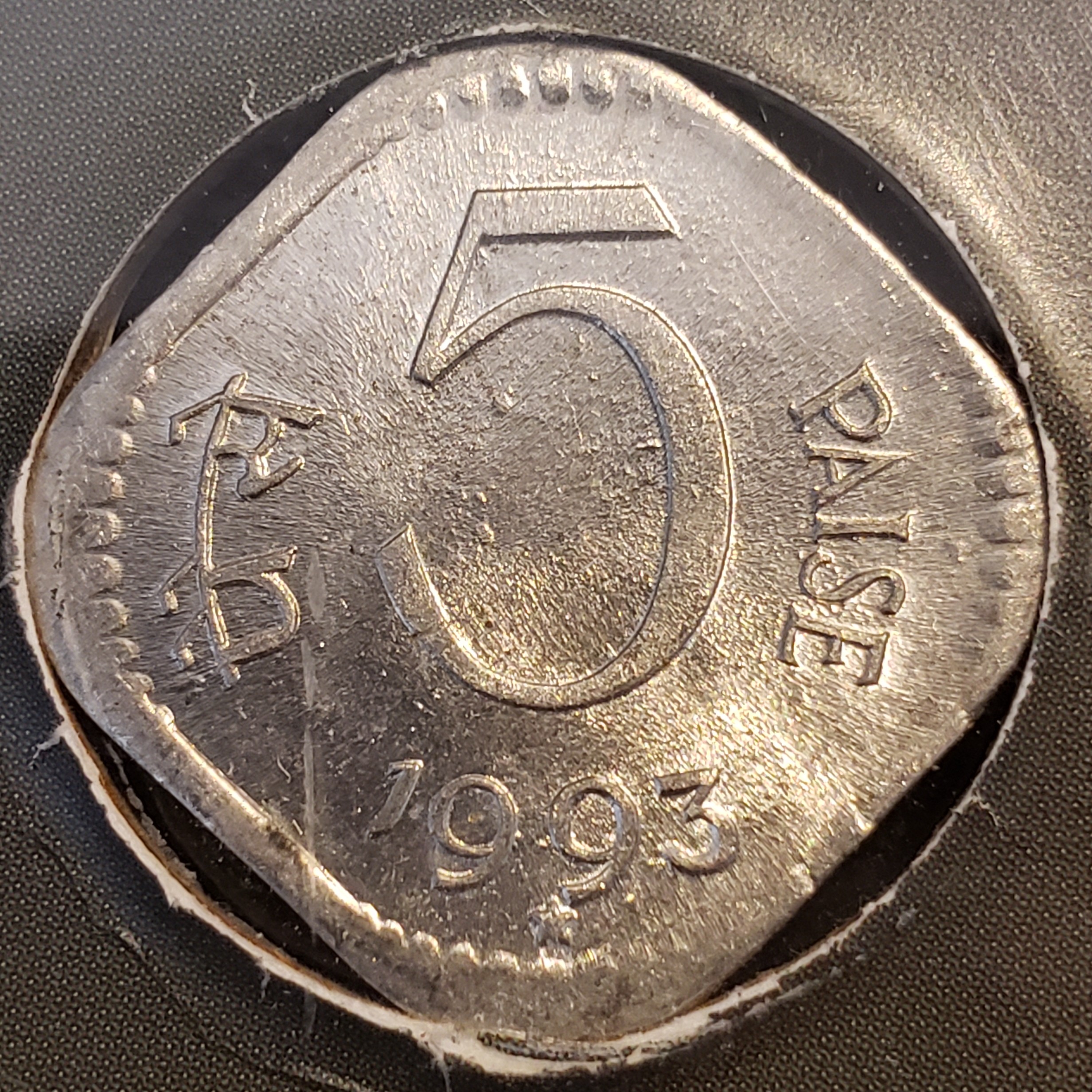 5 Paisa front