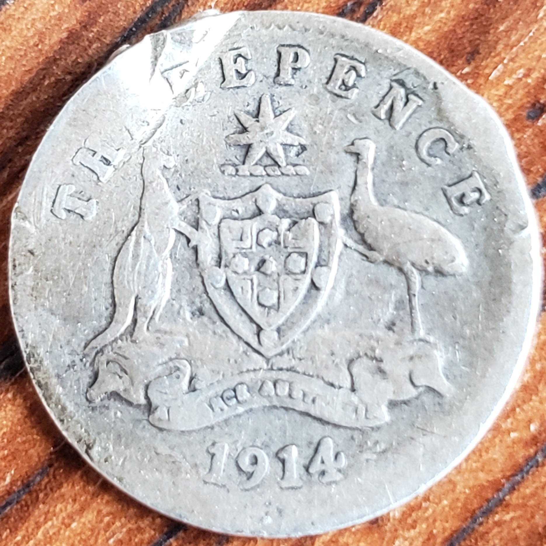 3 Pence back