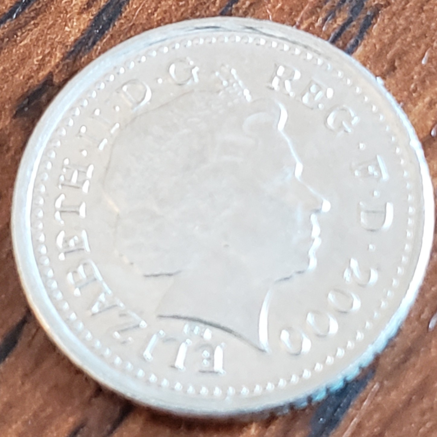5 Pence back