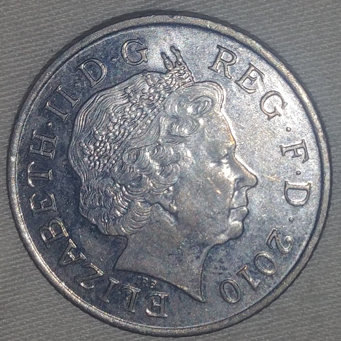 10 Pence back