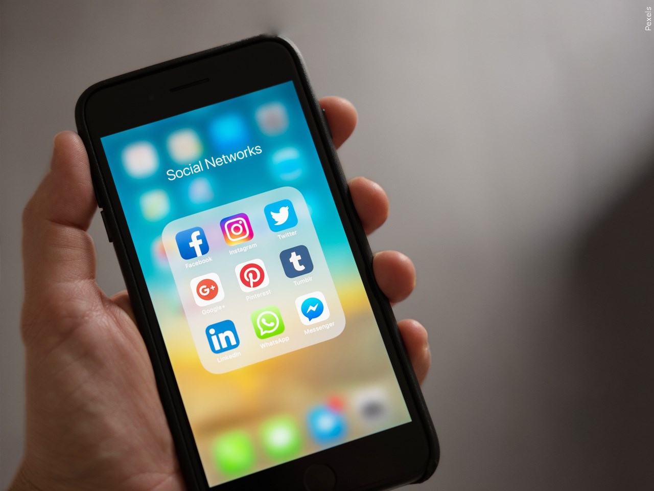 Americans Check Their Phones 205 Times a Day in 2024, Report Reveals