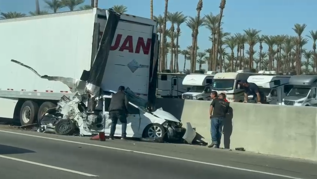 Major Accident on 10 Freeway Westbound Near Washington Exit, Small Vehicle Trapped Under Big Rig