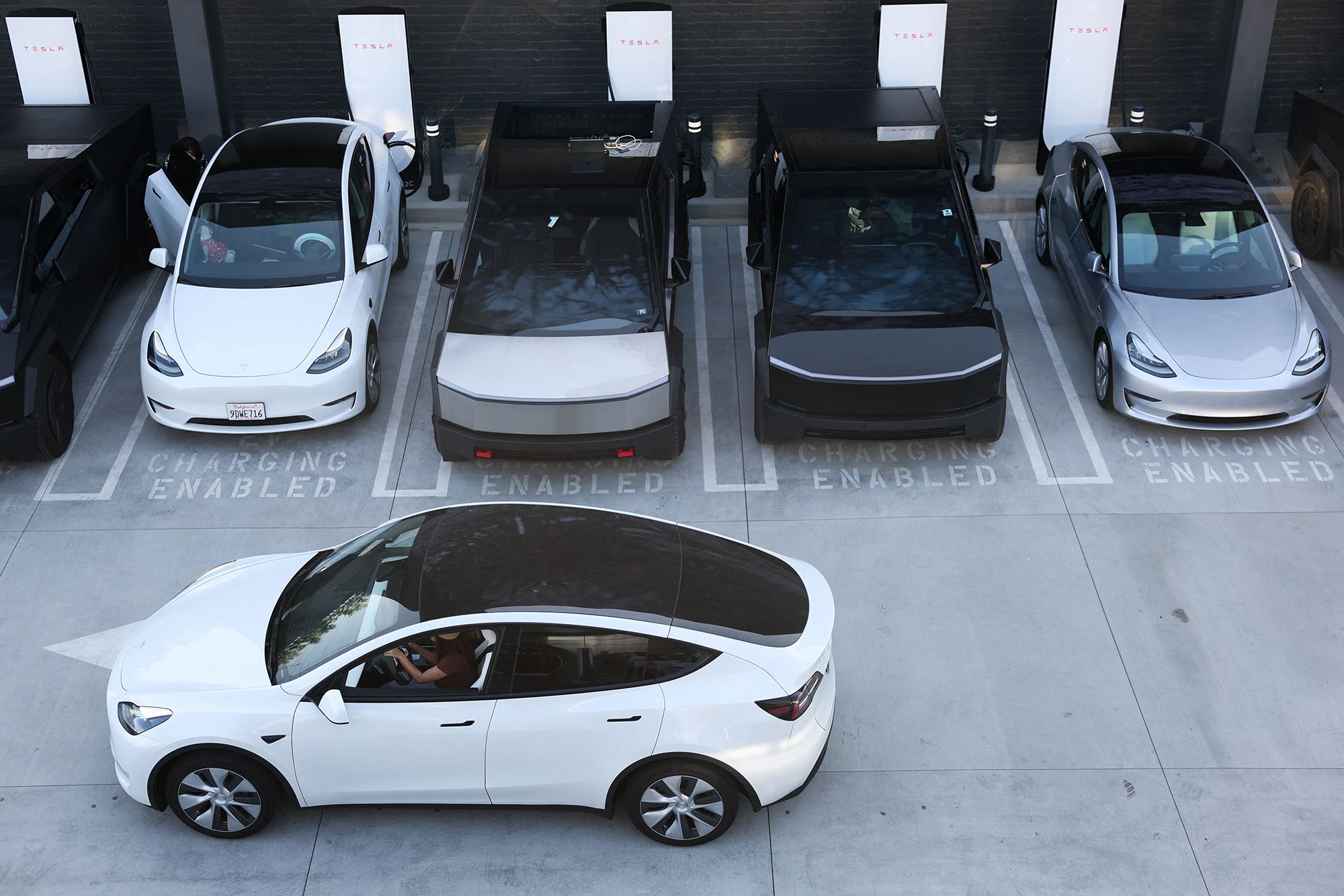 Tesla Earnings Drop 23% Amid Sales Slump and Growing EV Competition