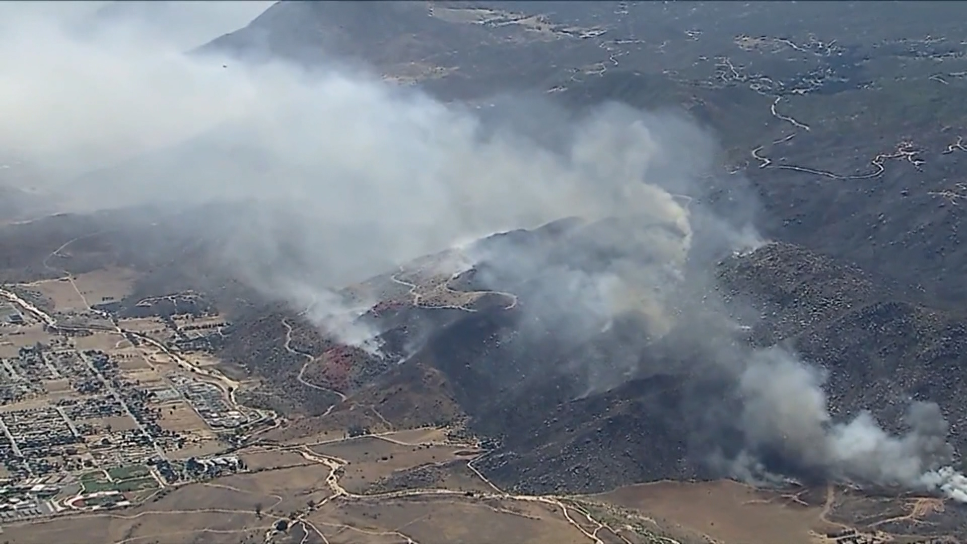 Crews Continue Effort to Snuff Wolf Fire