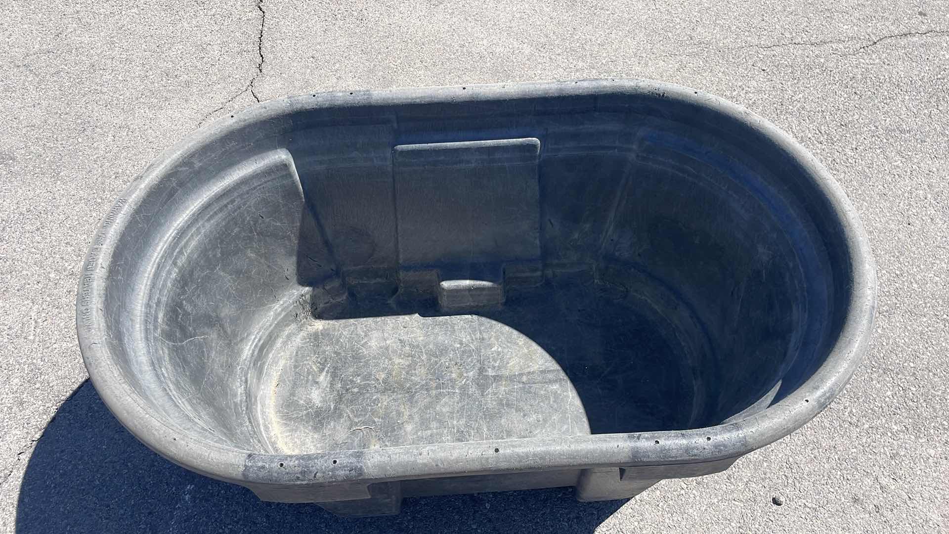 Photo 1 of RUBBERMAID 100 GAL STOCK TANK